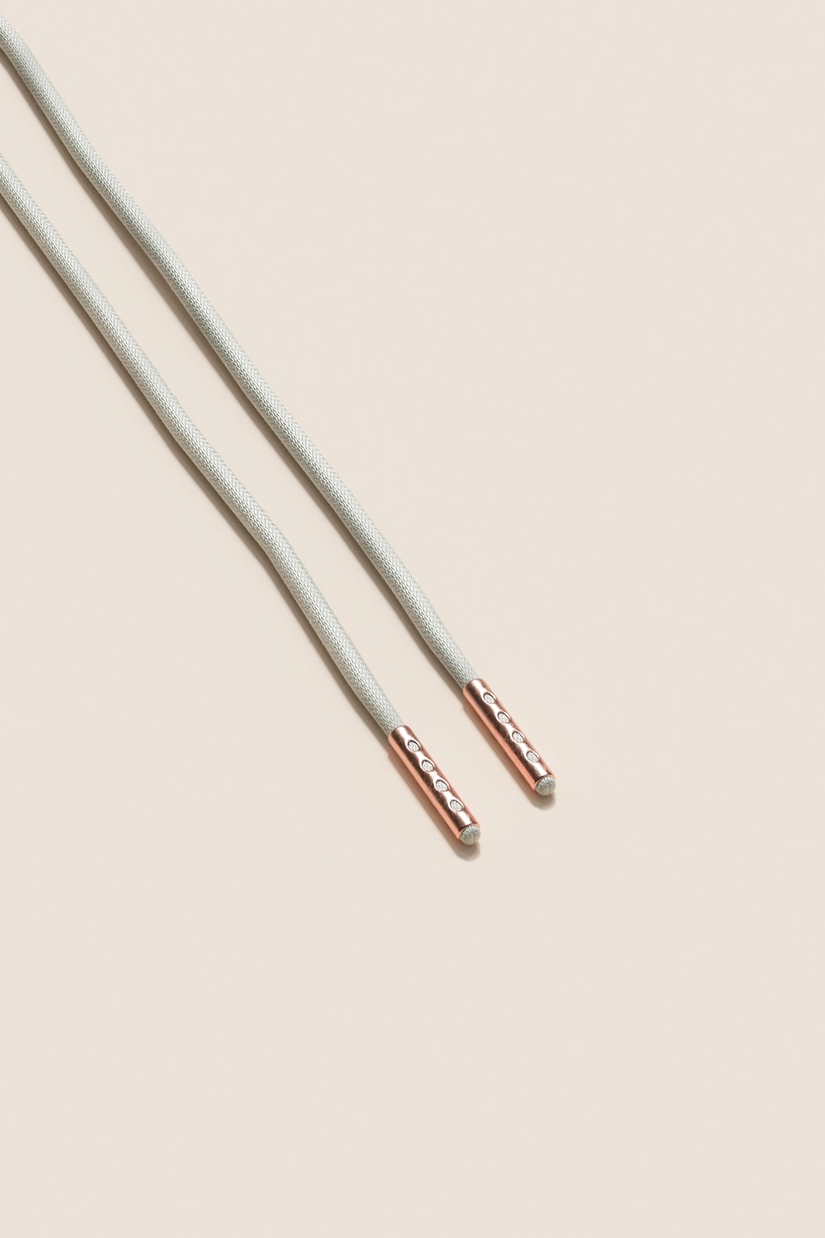 Senkels Light Grey 2.5mm Round Waxed Shoelaces with Rose Gold Aglets