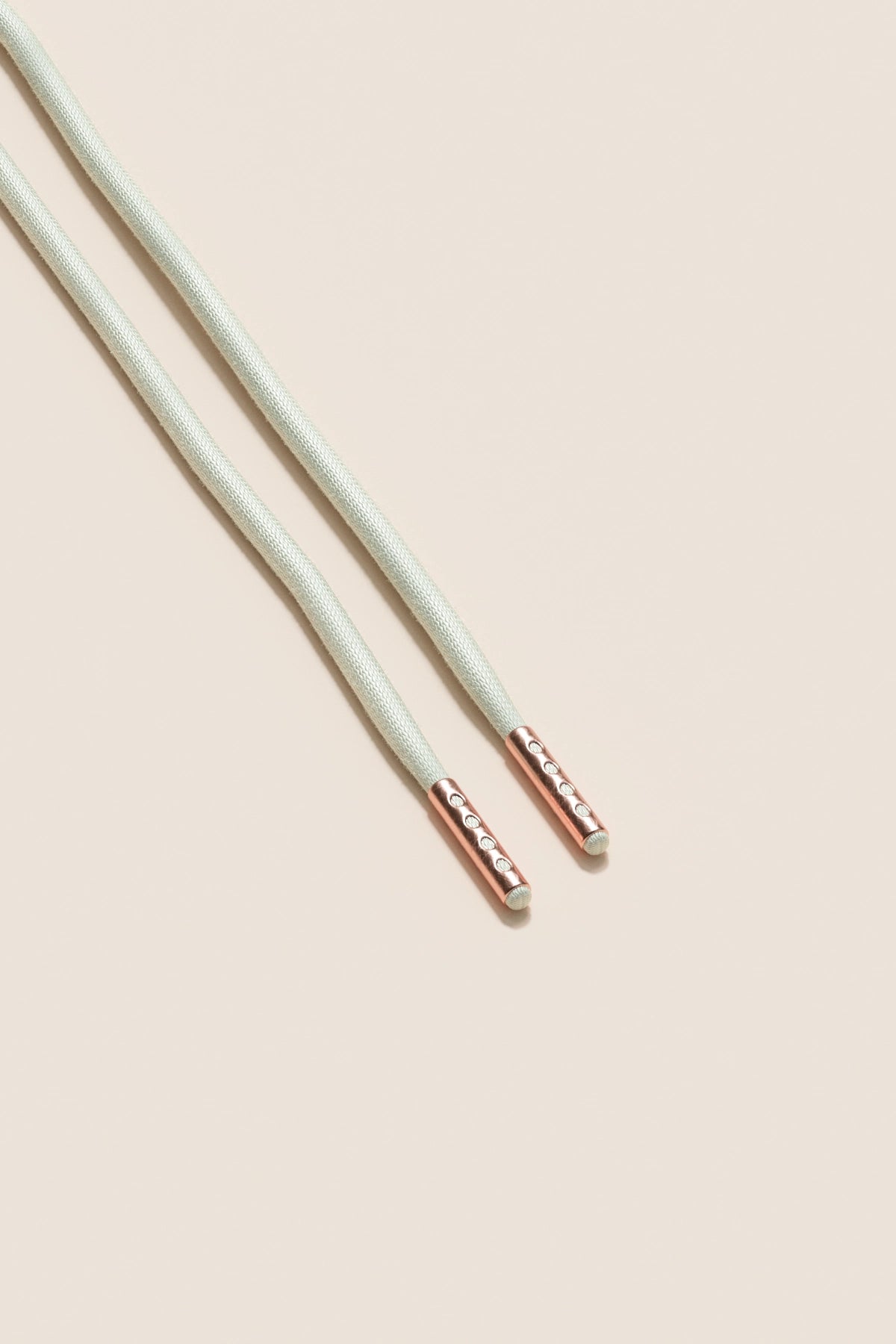 Senkels Off White 4mm Round Waxed Shoelaces with Rose Gold Aglets