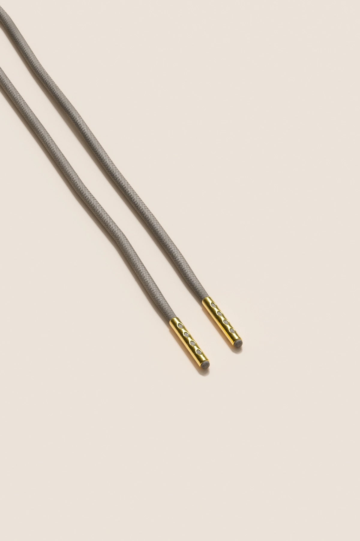 Senkels Graphite Grey 2.5mm Round Waxed Shoelaces with Gold Aglets