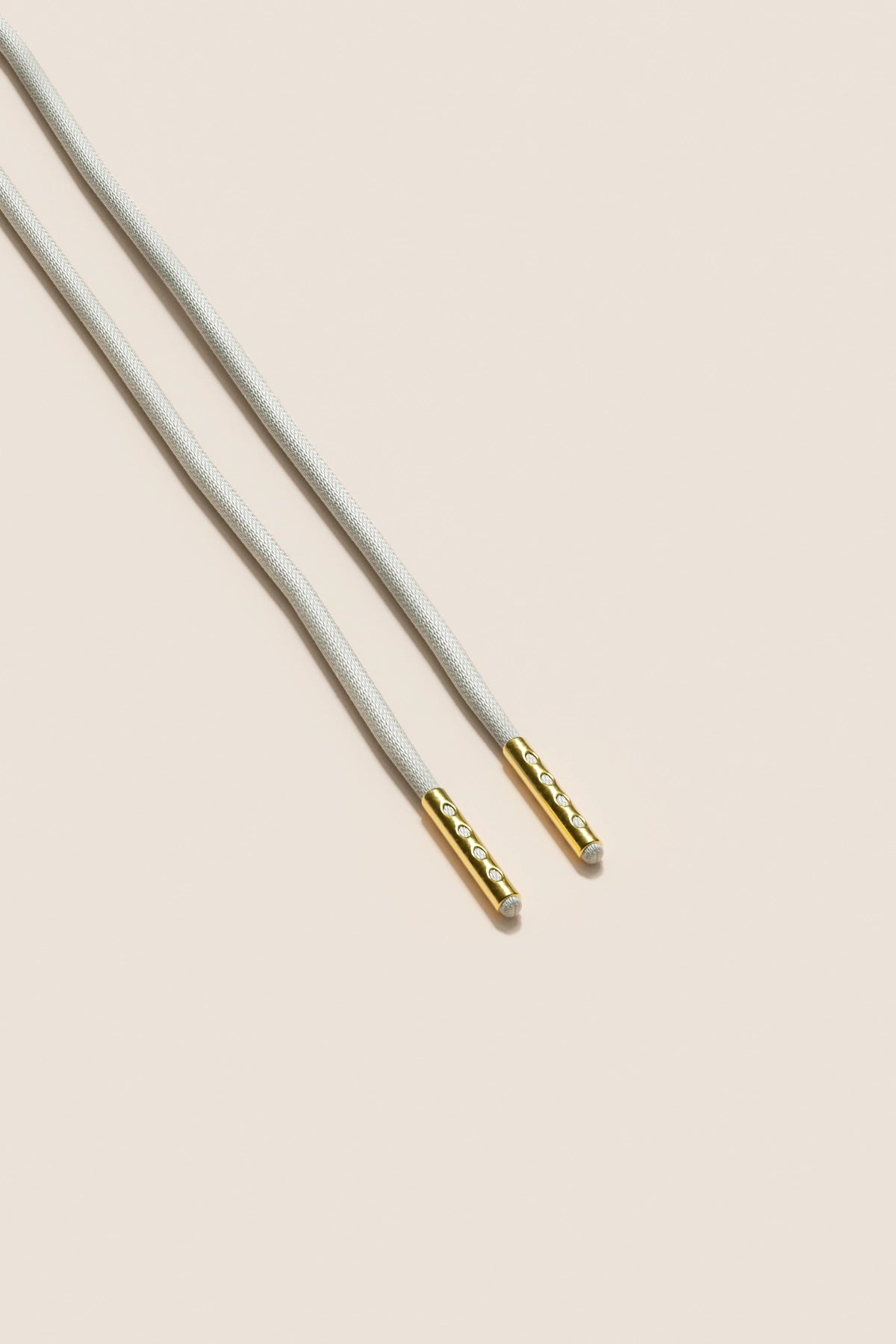Senkels Light Grey 2.5mm Round Waxed Shoelaces with Gold Aglets
